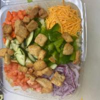 Garden Salad · Lettuce, tomatoes, onions, green peppers, cucumbers, carrots, sharp cheddar cheese,  crouton...