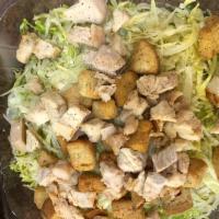Grilled Chicken Caesar Salad · Mounds of grilled chicken breast, lettuce, parmesan cheese, caesar dressing