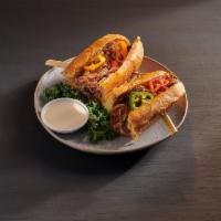 Philly Cheese Steak Sandwich · Shredded beef steak mixed with green and red pepper and onion, topped with your choice of ch...
