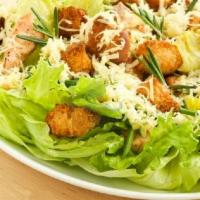 Caesar Salad · Green salad with Caesar dressing and cheese.