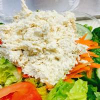 Cold Chicken Salad · Chopped chicken that has been tossed in a dressing.