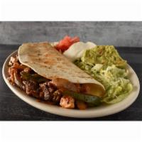Fajita Quesadilla · Your choice of steak or chicken in a huge flour tortilla filled with onions, peppers, Ranche...