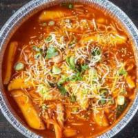 Tteokbokki · Rice cakes with carrots, onions, green onions In a spicy red sauce.