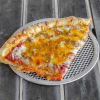 Taco Pizza · Taco meat, lettuce, tomatoes, mozzarella & cheddar cheese.