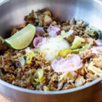 Sisig 'N' Rice · Pork, pickled onions, jalapenos, celery, garlic, sunny side up egg, tamari citrus sauce over...