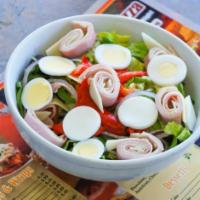 Cobb Salad · Grilled chicken, tomato, bacon, boiled egg, gorgonzola, and your choice of dressing.