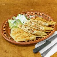 Quesadilla Suiza · Your choice of meat, and cheese with a side of guac, pico de gallo, and sour cream.