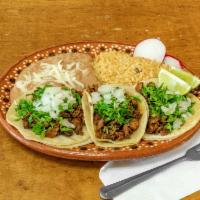 Kids Taco Plate · 1 Taco with only cheese and your choice of meat, served with rice and beans.