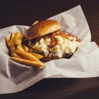 The Mac Daddy · 1/2 lb burger w/ smoked bacon & white cheddar macaroni & cheese.