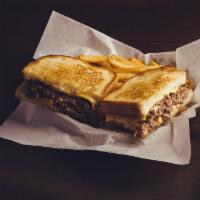Frisco Patty Melt · 1/2lb smash burger w/ sautéed red onions, American cheese, Swiss cheese & thousand island dr...