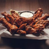 Smoked Wings · Hardwood smoked bone-in wings finished char-broiler or trashed (Smoked & Fried) then tossed ...