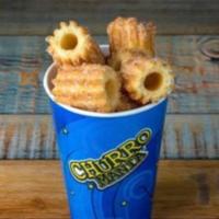 Churro Bites Crispy · 22oz cup of our bite-sized crispy churros pieces with explosive flavor, sprinkled with sugar...