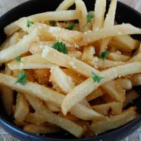 Garlic Parmesan Fries · Crispy french fries tossed in garlic butter parmesan sauce. 