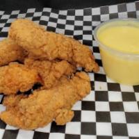 Chicken Fingers · Freshly deep fried chicken fingers. Served with your choice of 4 oz sauce: BBQ, homemade ran...