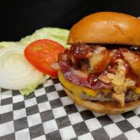 Bourbon BBQ Bacon Cheddar Burger · ½ lb hand-packed ground beef patty topped with cheddar cheese, bacon, Bourbon BBQ sauce, Bou...