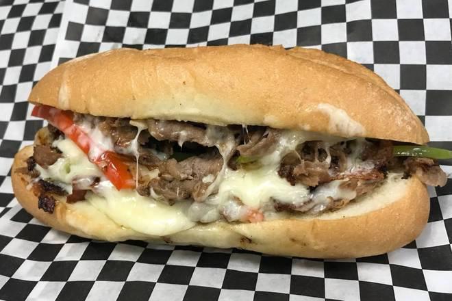 Philly Cheesesteak · Thinly sliced beef tossed with bell peppers ＆ onions, topped with melted provolone cheese on a hoagie roll. 