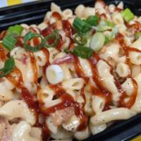 BBQ Chicken Mac & Cheese  · Creamy Mac & Cheese with BBQ chicken, bacon, and BBQ sauce mixed in, topped with green onion.