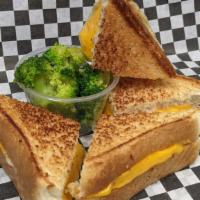 Kids Grilled Cheese with Side · A classic grilled cheese sandwich, with American cheese, served with your choice of steamed ...