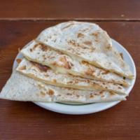 Quesadilla · Served with queso fresco, sour cream, and guacamole. Add meat for an additional charge.