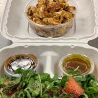 2. Chicken Shawarma Salad · A simple salad made with arugula, onions, and tomato with a side dressing of lemon juice, ol...