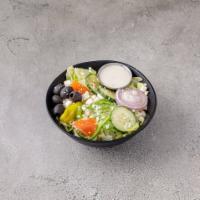 Greek Salad · Romaine and iceberg lettuce, tomatoes, onion, cucumber, green peppers, black olives, peppero...