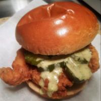 Spicy Cluck  · Spicy chicken filet on brioche bun with pickles and rooster sauce.
