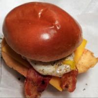 Wake the Cluck Up  · Fried chicken with bacon, egg, and cheddar on brioche bun.