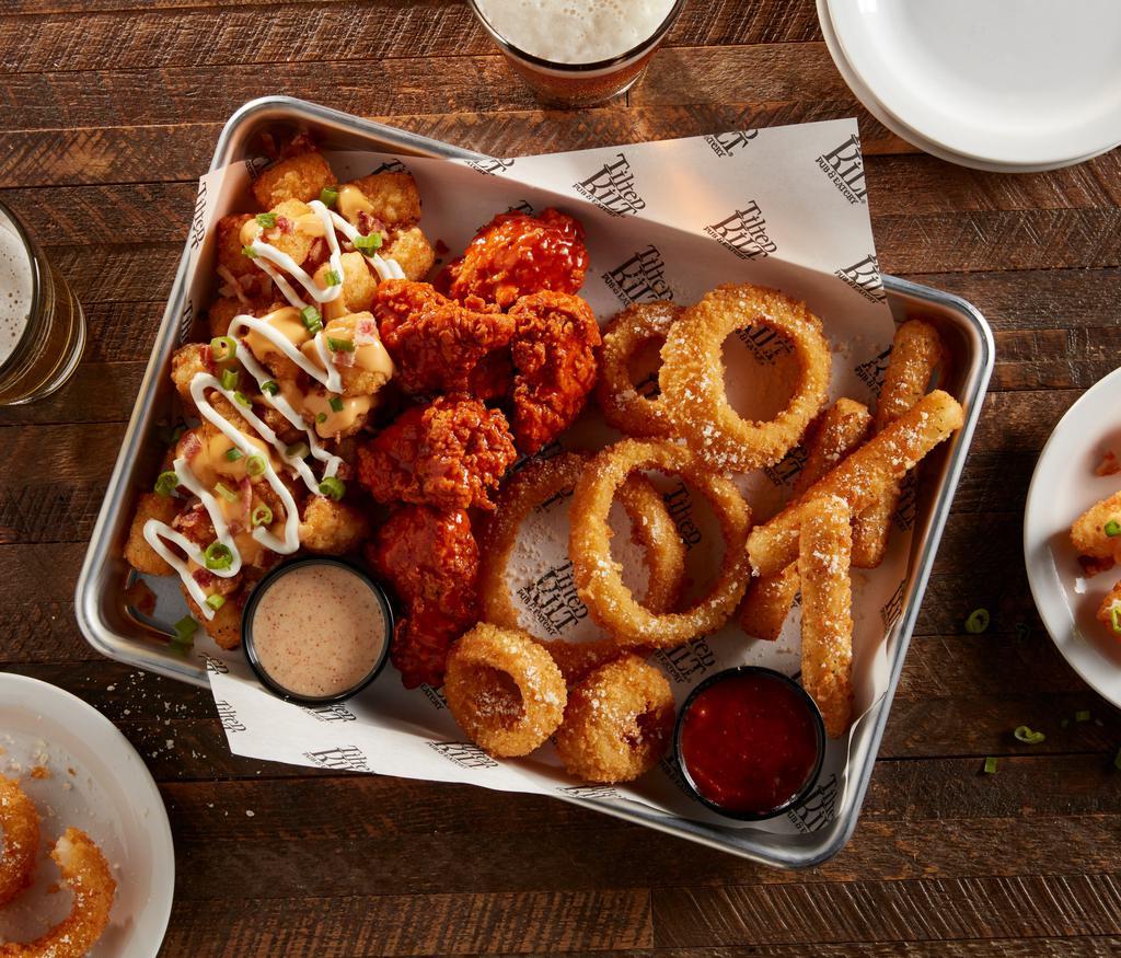 Sampler Platter · Boneless chicken wings, loaded tots, mozzarella sticks and fried pickles. Includes marinara and ranch.