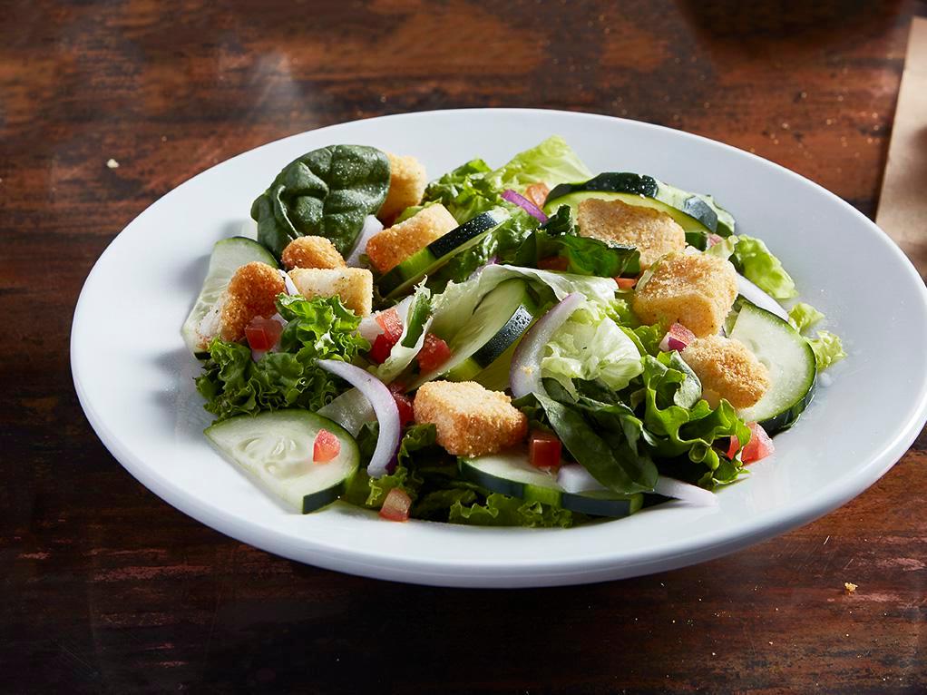 House Salad · Fresh greens, tomatoes, cucumbers, red onions and croutons. Tossed in choice of dressing. Available grilled chicken for an additional charge.