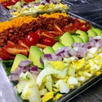 Mrs. Cobb Salad · Lettuce, tomato, bacon, eggs, red onion, avocado, and cheddar cheese. Consuming raw or under...