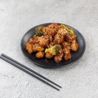 C7. General Gau's Chicken · Cubes of chicken coated with water chestnut flour and cooked with hot ginger sauce. Hot and ...