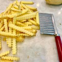 French Fries · Seasoned golden hand cut french fries