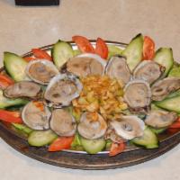 1 Dozen de Ostiones en su Concha · 1 dozen fresh oysters in shell.