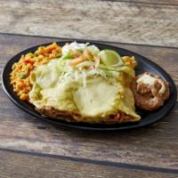 Enchiladas con Carne · 3 soft rolled tortillas filled with chicken or steak served with green or red sauce, topped ...