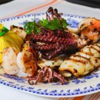 Grigliato Misto · Char-grilled shrimp, baby octopus, calamari, in lemon-parsley vinaigrette.