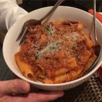 Rigatoni in Sausage Gravy · Small pasta with ground sausage, crushed tomatoes, sliced garlic and red pepper flakes. 