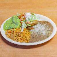23. Taquitos con Guacamole Lunch Special · 3 rolled taquitos with your choice of shredded beef or chicken, side of guacamole, lettuce, ...