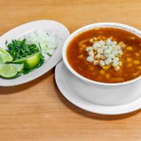 Menudo · Traditional authentic menudo made with beef tripe, hominy served with chopped onions, cilant...