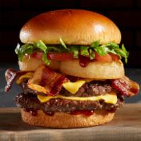 BBQ Bacon Tribeca Burger Combo · 1/2 Lb Angus Beef, BBQ sauce, Ranch Dressing onion rings, bacon, lettuce, tomato and cheese....