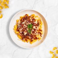 Sauce Party Mac · Just a twist of flavor: Caramelized onions, BBQ cheese sauce, and roasted spicy chicken cook...