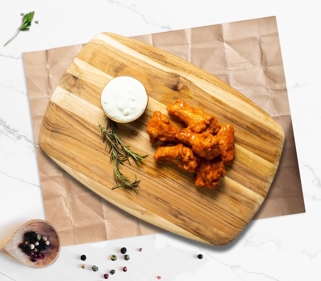 On The Wing Side · You gotta love classics: Six or twelve chicken wings with your choice of buffalo sauce, BBQ sauce, or thai chili sauce served with ranch and bleu cheese