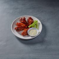 5 Pieces Wings · Cooked wing of a chicken coated in sauce or seasoning.