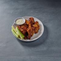 10 Pieces Wings · Cooked wing of a chicken coated in sauce or seasoning.