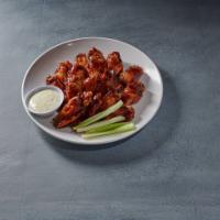 15 Pieces Wings · Cooked wing of a chicken coated in sauce or seasoning.