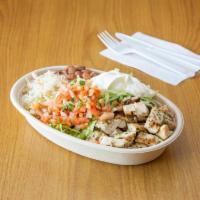 Grilled Chicken Bowl · Served with Rice, Pinto beans,lettuce,pico de gallo and sour cream