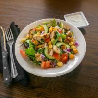 House Salad · Fresh mixed greens tossed with parmesan, cucumber, red onion, tomato and croutons. Vegetaria...