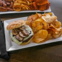 Mushroom Swiss Burger* · 1/2 pound Certified Angus Beef* patty, charbroiled and topped with crimini mushrooms and Swi...