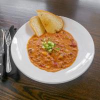 Shellfish Chowder · Rich cream finished chowder with bacon, clams, shrimp, and tomatoes.