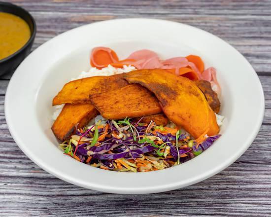 Vegetarian Curry Bowl · Fried porcini dusted sweet potato. Served over chicken rice with sesame slaw, fukujinzuke, and our house-made curry sauce.