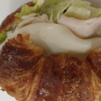 The Executive Sandwich · Turkey, avocado and mozzarella on croissant.